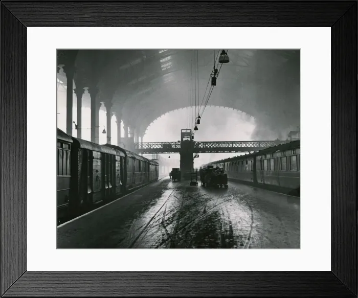 Framed Print : Liverpool Street Station in London The Arched roof is filed with smoke from a steam