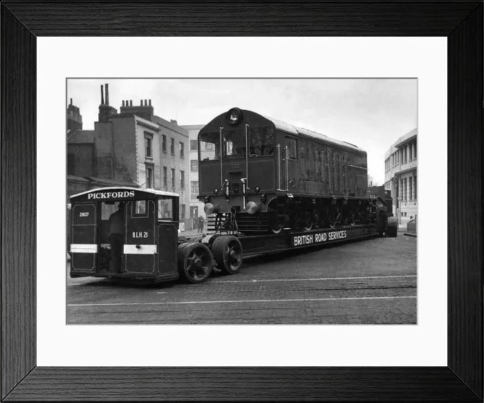 Framed Print : Pickfords transport a diesel electric locomotive train engine from Newton le Willows Framed Print : Pickfords transport a diesel electric locomotive train engine from Newton le Willows