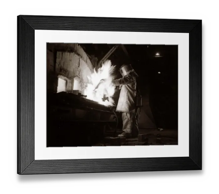 Framed Print : A welder wearing a suit designed to keep you cool at temperatures of 500 degrees Framed Print : A welder wearing a suit designed to keep you cool at temperatures of 500 degrees
