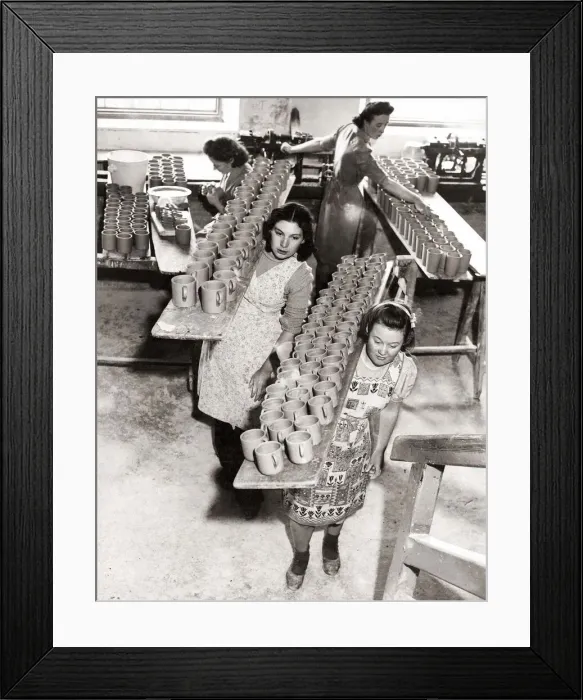 Framed Print : Norah Dunn and Friend working at the Tyneside Pottery, carrying a tray of Mugs Framed Print : Norah Dunn and Friend working at the Tyneside Pottery, carrying a tray of Mugs