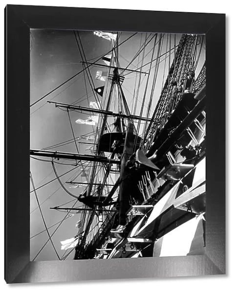 HMS Victory the flagship of the fleet flying signal flags for King George V Silver