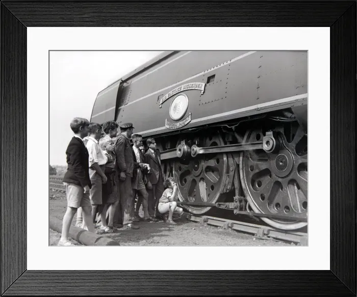 Framed Print : Small boys admire the Battle of Britain class steam locomotive during an open day