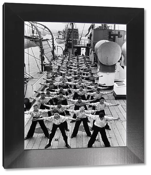 Sea Cadets run through an exercise routine on the deck of SS Warspite August 1938