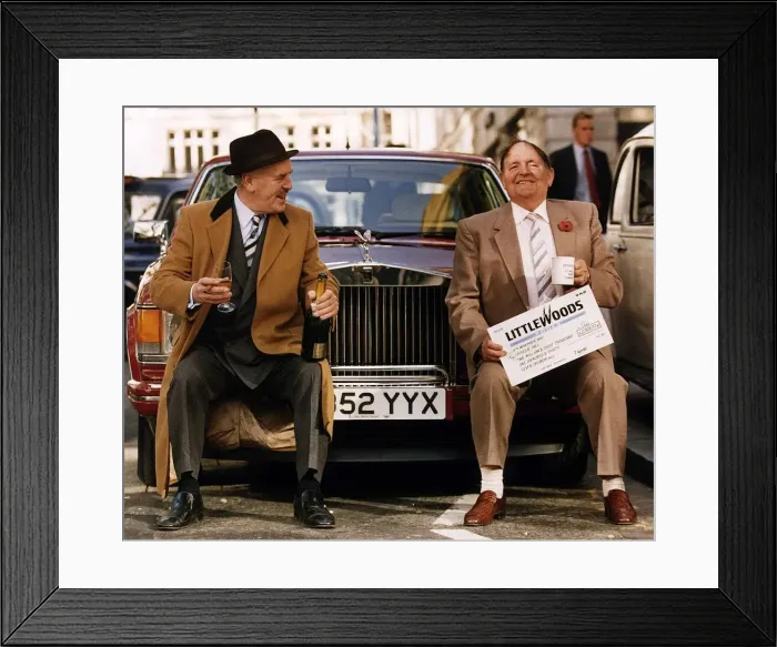 Framed Print : Christopher Hill Littleswoods pools winner sitting on Rolls Royce car bumper with actor Framed Print : Christopher Hill Littleswoods pools winner sitting on Rolls Royce car bumper with actor
