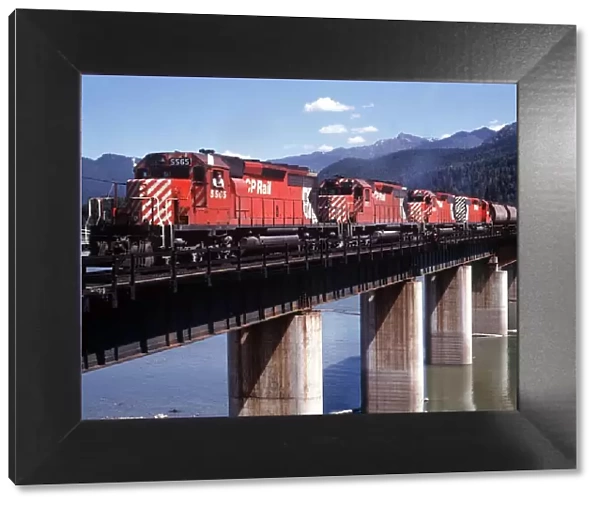 Revelstoke British Columbia Canada Freight train pulled by four diesel engines