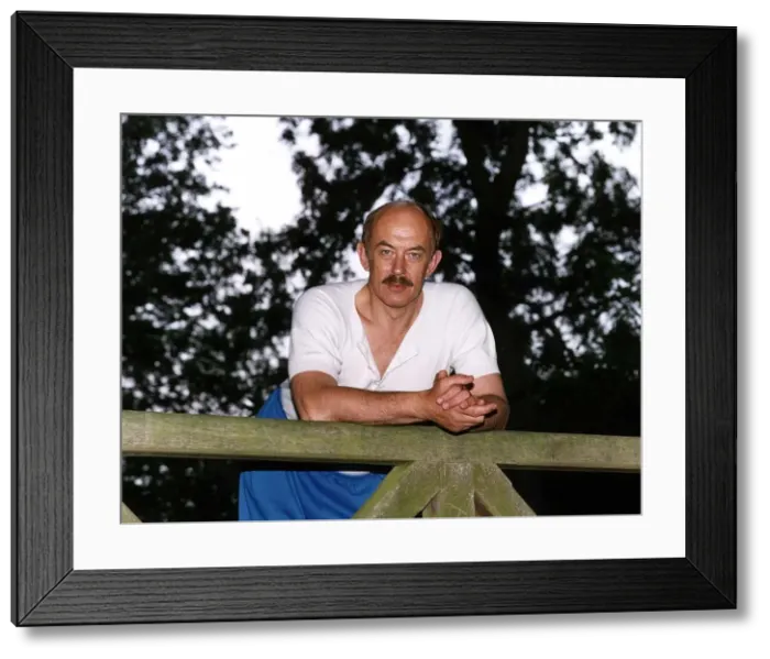 Framed Print : Roy Marsden actor leaning over wooden gate Framed Print : Roy Marsden actor leaning over wooden gate