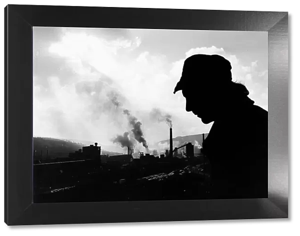 A Welsh steelworker on his way home from the British steel works at Ebbw Vale South Wales