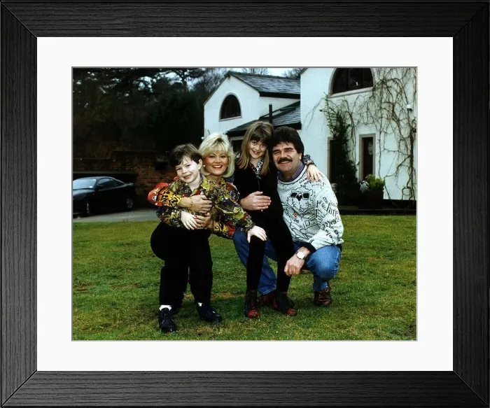 Framed Print : Bob Carolgees TV Presenter Surprise Surprise with family at home in garden