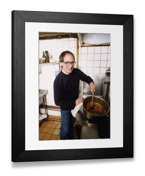 Framed Print : Loyd Grossman TV Presenter of Master Chef in his own kitchen trying out his own cooking