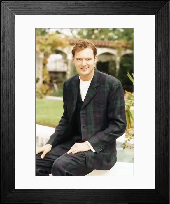 Framed Print : John Leslie TV Presenter sitting wearing tartan suit Framed Print : John Leslie TV Presenter sitting wearing tartan suit