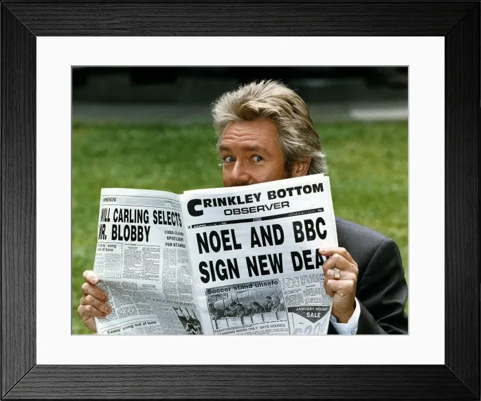 Framed Print : Noel Edmonds Tv Presenter reading newspaper called the Crinkley Bottom Observer after Framed Print : Noel Edmonds Tv Presenter reading newspaper called the Crinkley Bottom Observer after