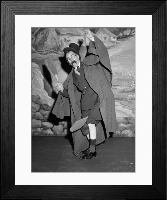Framed Print : Comedian Eddie Gray seen here holding skittles wearing a false moustache Comic Framed Print : Comedian Eddie Gray seen here holding skittles wearing a false moustache Comic