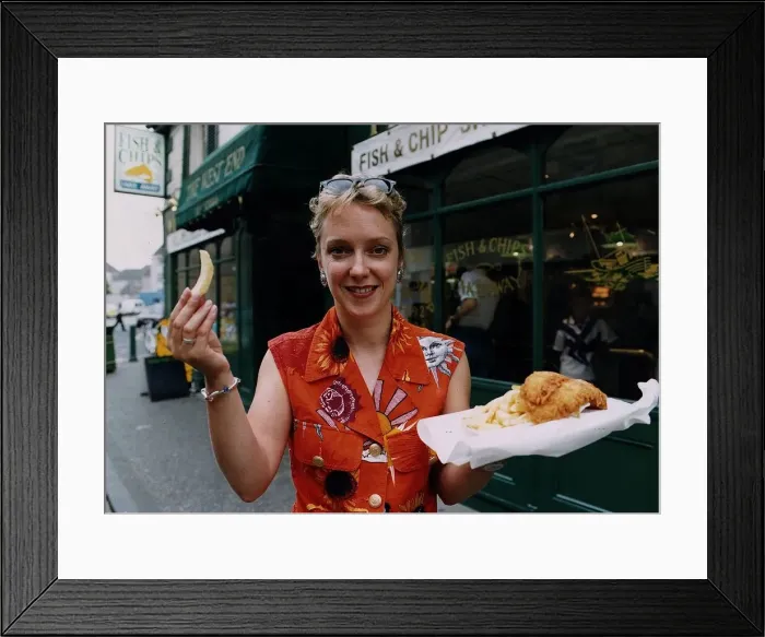 Framed Print : Janice Forsyth TV presenter in Rothesay fish chips supper orange shirt