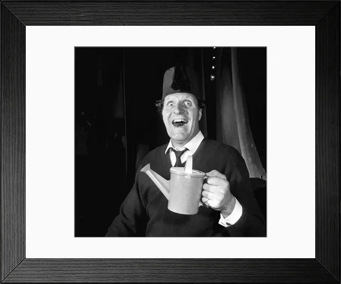 Framed Print : Tommy Cooper comedian wearing fez hat June 1965 and holding toy watering can Framed Print : Tommy Cooper comedian wearing fez hat June 1965 and holding toy watering can