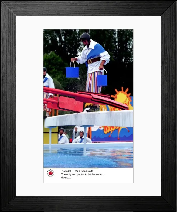 Framed Print : Contestants in the TV Programme Its A Knockout Aug 1999 wearing funny costumes playing Framed Print : Contestants in the TV Programme Its A Knockout Aug 1999 wearing funny costumes playing