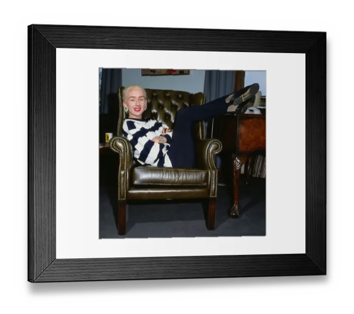 Framed Print : Muriel Gray TV presenter sitting in an armchair