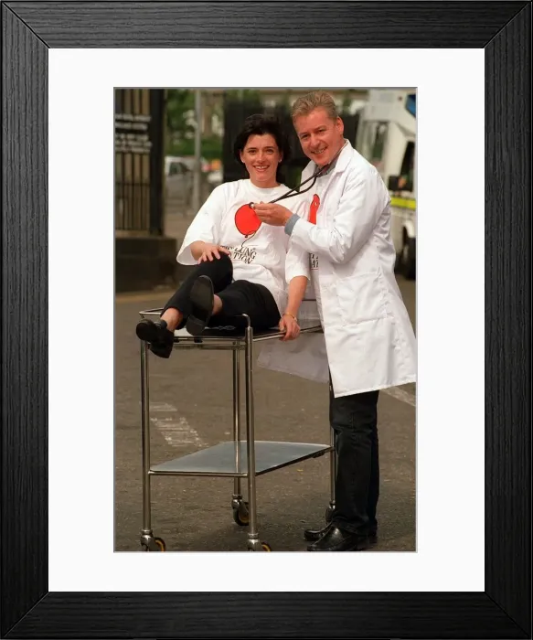 Framed Print : Jim white tv presenter pic shows jim white s. t. v presenter gives elaine anderson a few Framed Print : Jim white tv presenter pic shows jim white s. t. v presenter gives elaine anderson a few