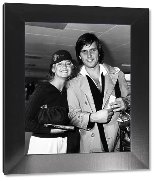 Goldie Hawn, American actress and boyfriend Bruno Wintzell, at London Heathrow Airport