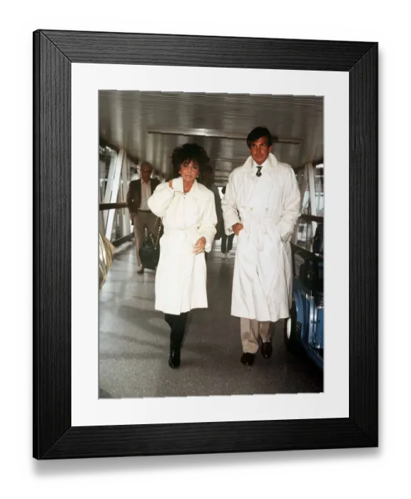 Framed Print : Elizabeth Taylor actress August 1986 at Heathrow Airport with George Hamilton Framed Print : Elizabeth Taylor actress August 1986 at Heathrow Airport with George Hamilton