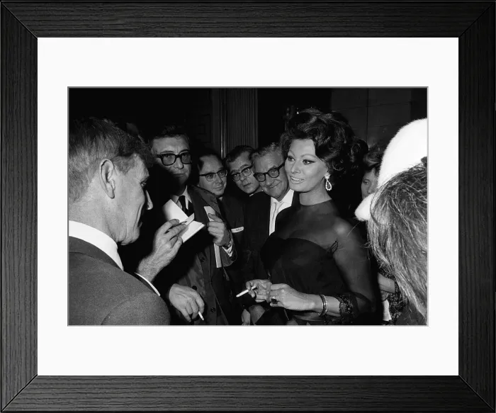 Framed Print : Sophia Loren and Charlie Chaplin (not shown) - November 1965 at a press conference Framed Print : Sophia Loren and Charlie Chaplin (not shown) - November 1965 at a press conference