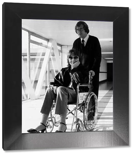Actress Diana Rigg who is in a wheelchair due to a problem with her spine 1979