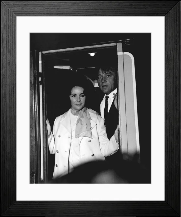 Framed Print : Elizabeth Taylor Aug 1968 and husbad Richard Burton (R) at Waterloo Station