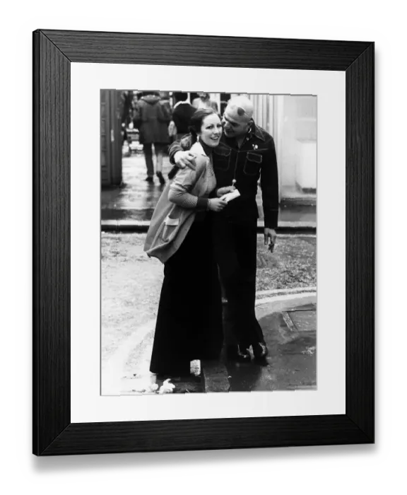 Framed Print : Telly Savalas Greek actor meets fan in London street Circa 1978