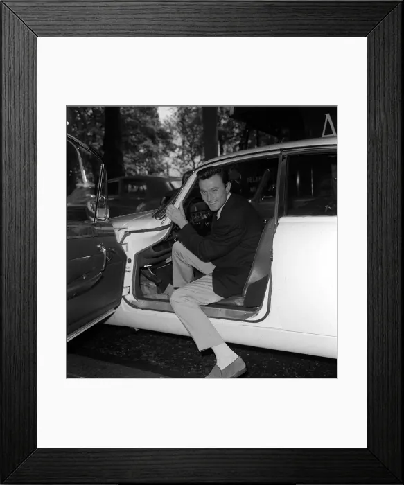 Framed Print : Lawrence Harvey actor getting out of his car June 1962