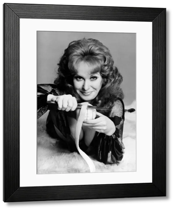 Framed Print : Carol Cleveland actress peeling orange with knife 1971 Framed Print : Carol Cleveland actress peeling orange with knife 1971