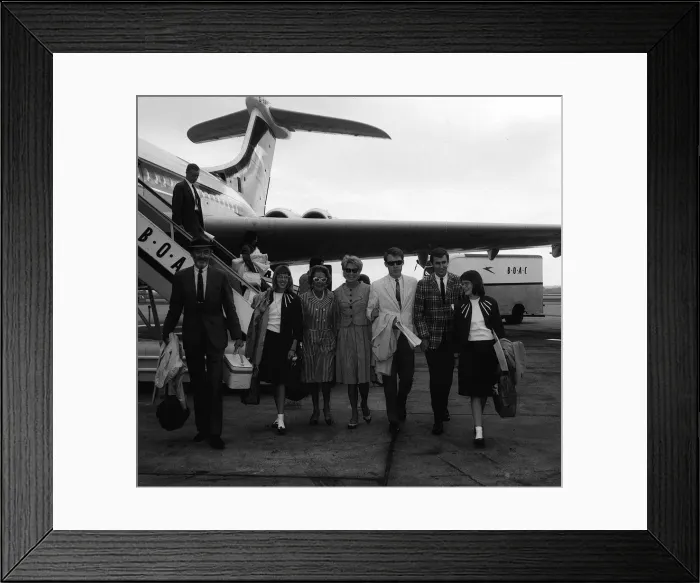 Framed Print : James Stewart arrives at London Airport with his wife Gloria Framed Print : James Stewart arrives at London Airport with his wife Gloria