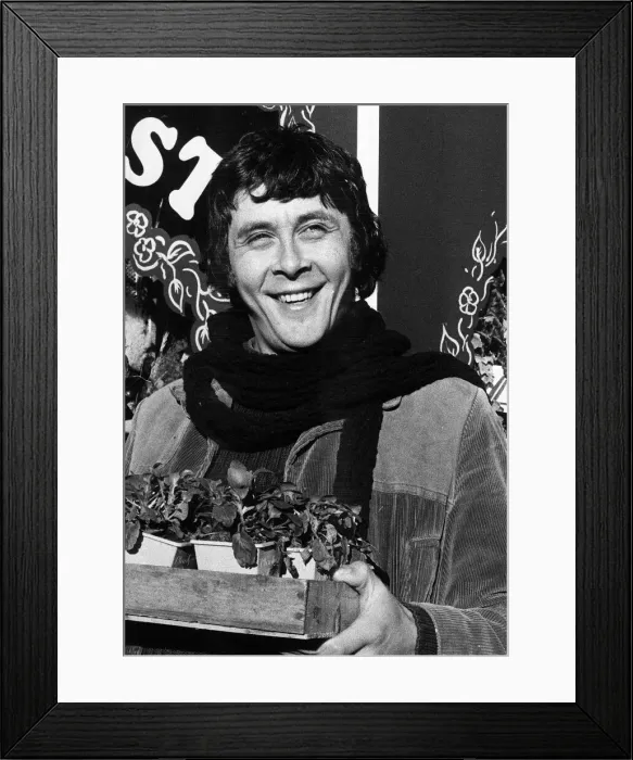 Framed Print : Richard Beckinsale actor with pot plants Circa 1979 Framed Print : Richard Beckinsale actor with pot plants Circa 1979