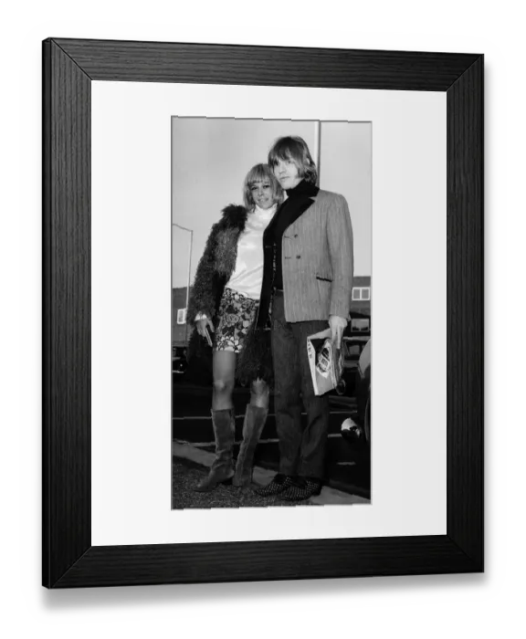 Framed Print : Rolling Stones: Brian Jones with girlfriend Anita Pallenberg at Los angeles airport 2nd