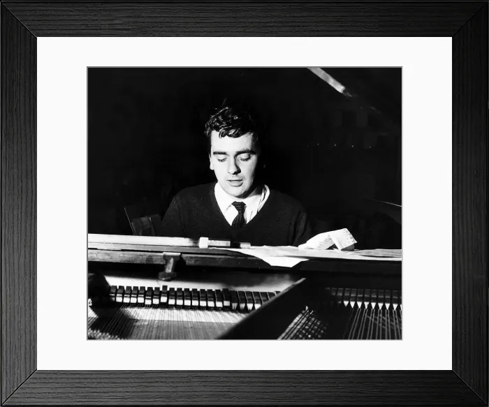 Framed Print : Dudley Moore actor comedian jazz pianist playing at the piano festival Framed Print : Dudley Moore actor comedian jazz pianist playing at the piano festival