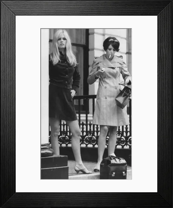 Framed Print : Brigitte Bardot French actress outside London flat 1966 with friend Framed Print : Brigitte Bardot French actress outside London flat 1966 with friend
