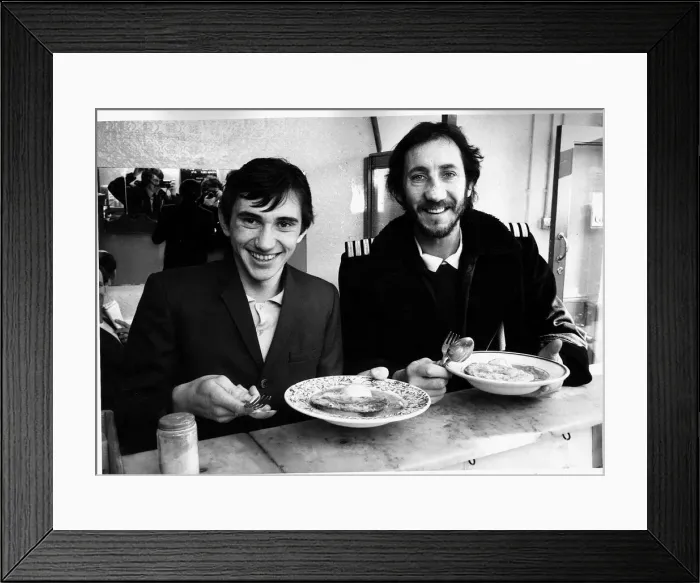 Framed Print : The Who pop guitarist Pete Townshend eating 1978 lunch with British actor Framed Print : The Who pop guitarist Pete Townshend eating 1978 lunch with British actor