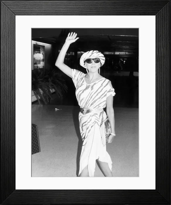 Framed Print : Joan Collins actress leaving London for Los Angeles to start a shoot of a new series of
