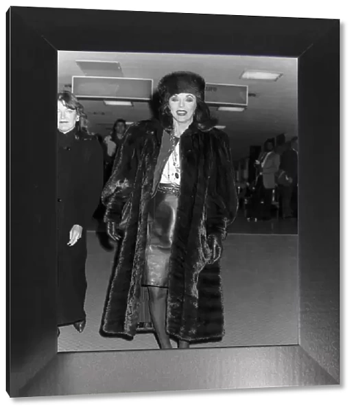 Joan Collins actress starred in Dynasty arrives at Heathrow. November 1988