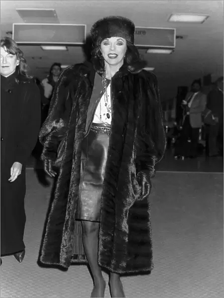 Joan Collins actress starred in Dynasty arrives at Heathrow. November 1988
