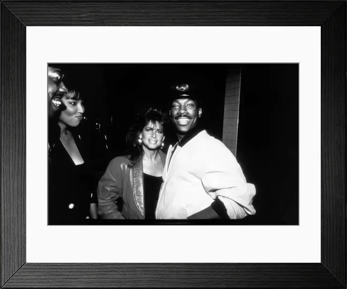 Framed Print : Eddie Murphy actor / comedian out with his latest date. November 1988 Framed Print : Eddie Murphy actor / comedian out with his latest date. November 1988