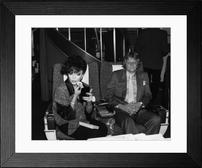 Framed Print : Joan Collins and Peter Holm in March 1985 Framed Print : Joan Collins and Peter Holm in March 1985