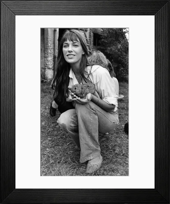 Framed Print : Jane Birkin English actress pop singer with rabbit 1977 Framed Print : Jane Birkin English actress pop singer with rabbit 1977