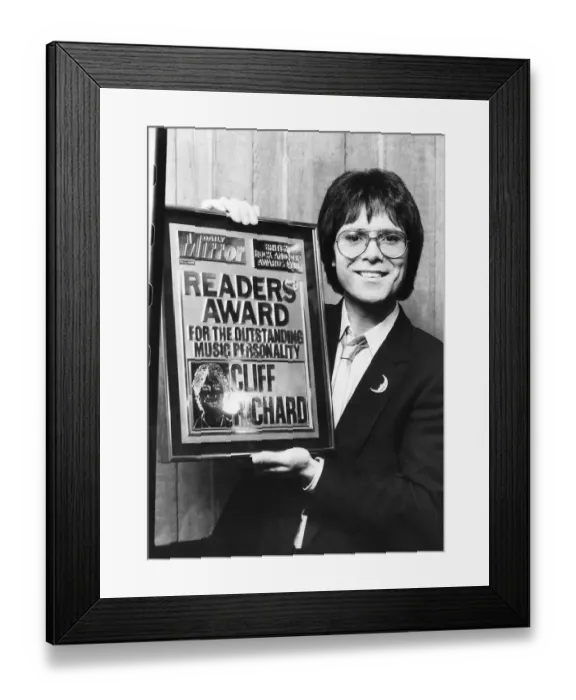Framed Print : Cliff Richard singer actor recieves a Daily Mirror award for music personality of