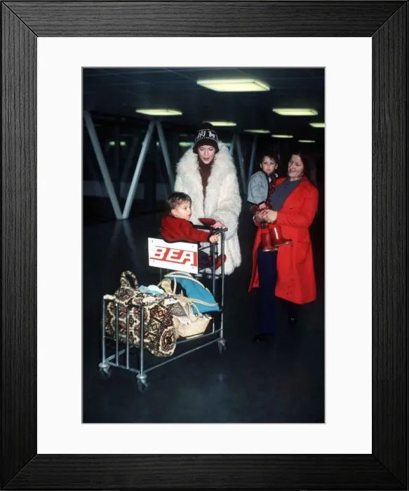 Framed Print : Mia Farrow actress at airport with children MSI Framed Print : Mia Farrow actress at airport with children MSI