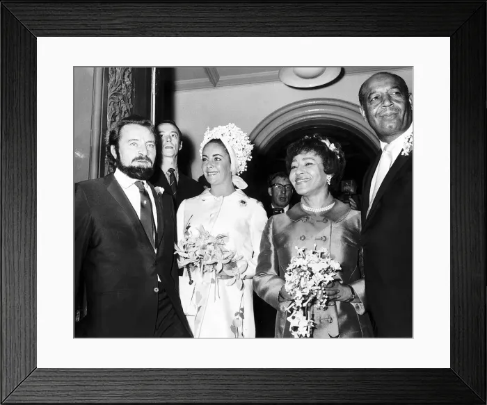 Framed Print : Richard Burton actor with wife Elizabeth Taylor at the wedding of his personal assistant Framed Print : Richard Burton actor with wife Elizabeth Taylor at the wedding of his personal assistant