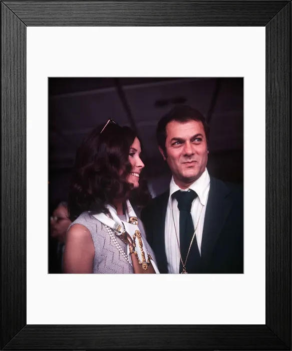 Framed Print : Tony Curtis in London with his wife Framed Print : Tony Curtis in London with his wife