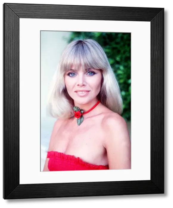Framed Print : Actress Britt Ekland wearing rose necklace July 1977 Framed Print : Actress Britt Ekland wearing rose necklace July 1977