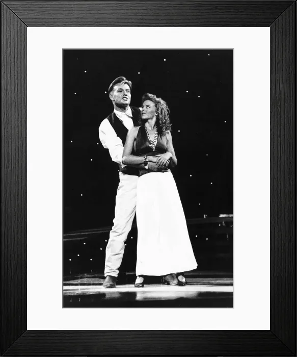 Framed Print : Kylie Minogue singer and actress with Jason Donovan singer and actor Framed Print : Kylie Minogue singer and actress with Jason Donovan singer and actor
