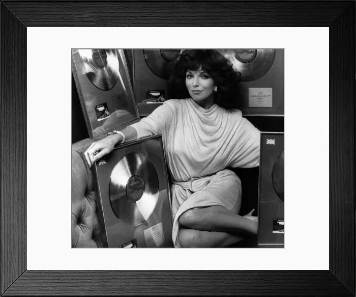 Framed Print : Joan Collins actress presented with A Golden Record to celebrate sales in the UK