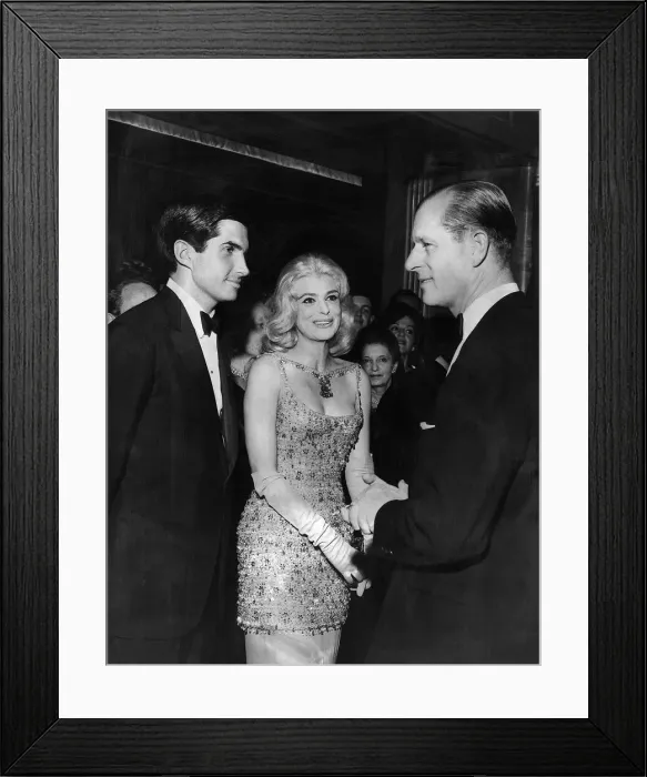 Framed Print : Prince Philip at the premier of the film The Victors meeting some of the stars of
