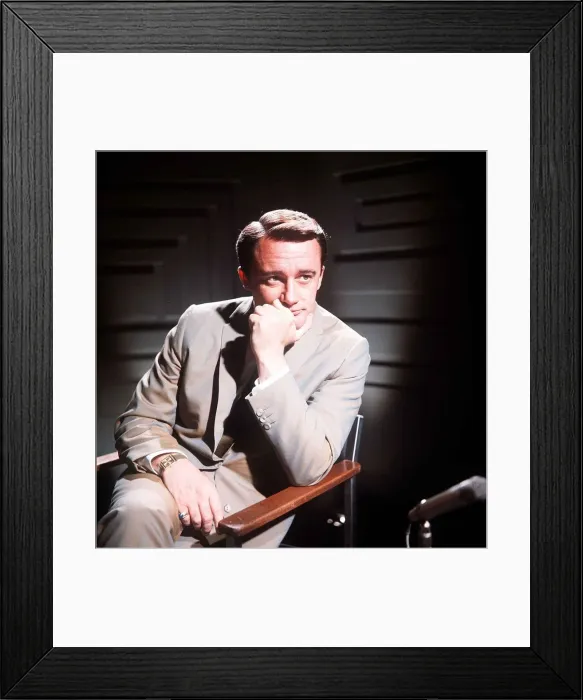 Framed Print : American actor Robert Vaughn sitting with his chin in his hand Framed Print : American actor Robert Vaughn sitting with his chin in his hand
